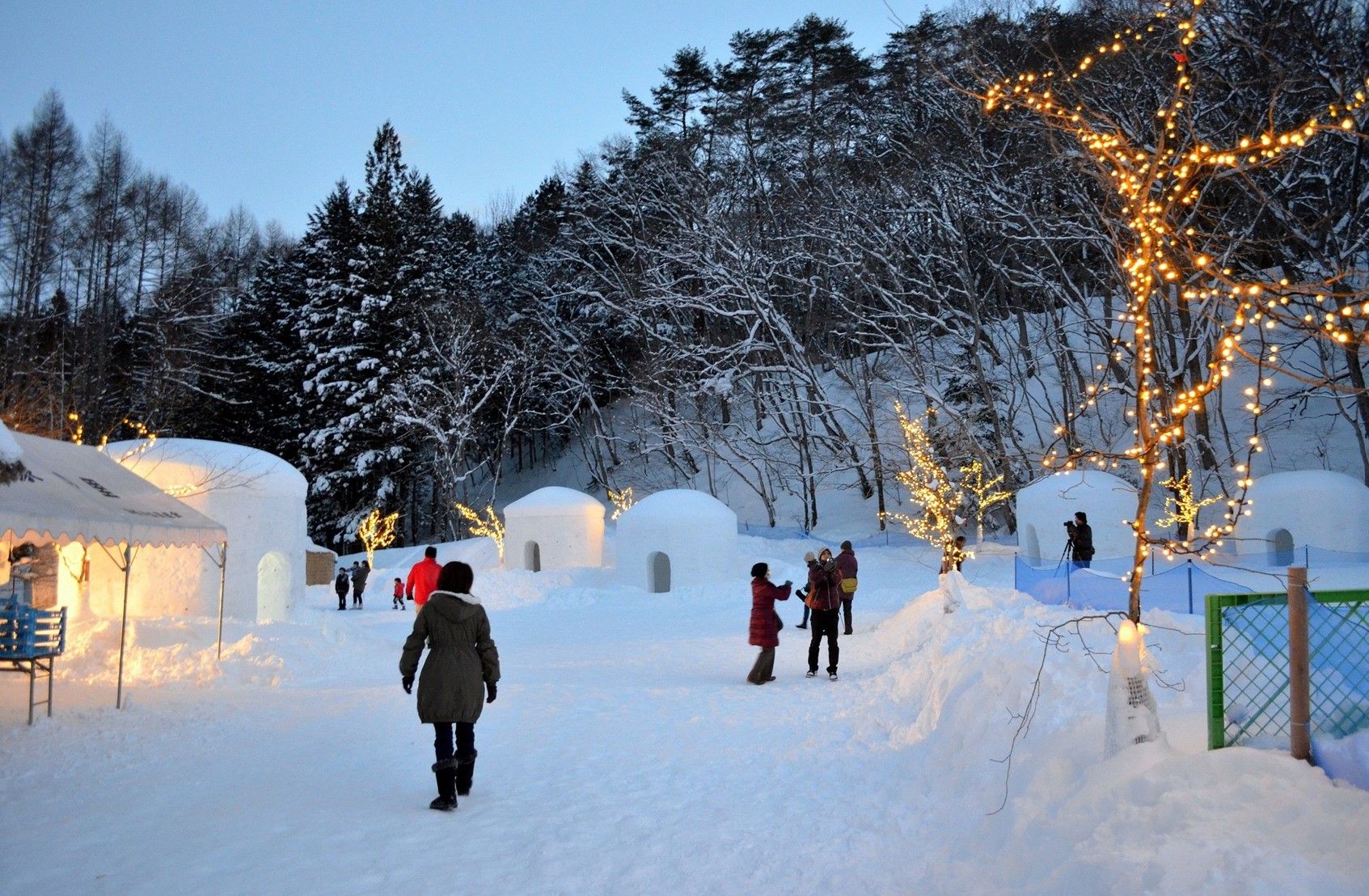 People Enjoying Yunishigawa Snow Huts